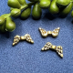 10 Metall Flügelperle  mini 15x7mm