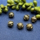 6 Acrylperlen altgold antik
