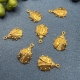 2 Anhänger Marienkäfer goldfarbig