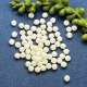 100 Acrylperlen Facettenperlen cremefarbig