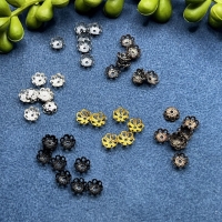 100 (= 6 gr.) Perlkappen  Blumenform 6,0mm altsilber