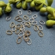 20 ovale Biegeringe 7,0x5,0x0,8mm versilbert