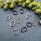 20 ovale Biegeringe 10,0x7,5x1,2mm silberfarbig