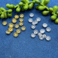100 (= 3gr.)  Perlkappen Blumenform 6,5mm gold