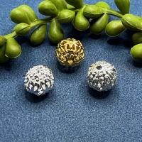 10 Filigranperlen Blumen-Ornament 13mm goldfarbig gebeizt