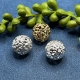 10 Filigranperlen Blumen-Ornament 15mm goldfarbig gebeizt