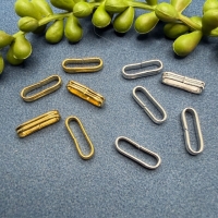 10 ovale Biegeringe Schlaufen mit Rille goldfarbig...