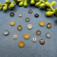 20 Perlkappen Blumenform 6,8mm schwarz