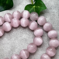 10 Glasperlen Cateyeperlen rund 10mm rosé